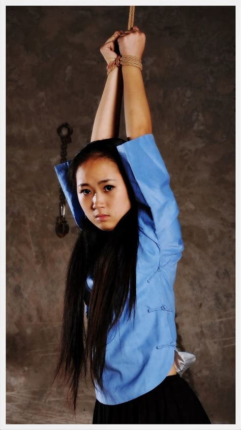 Choose from a wide range of similar scenes. . Asian girl hands tied above head